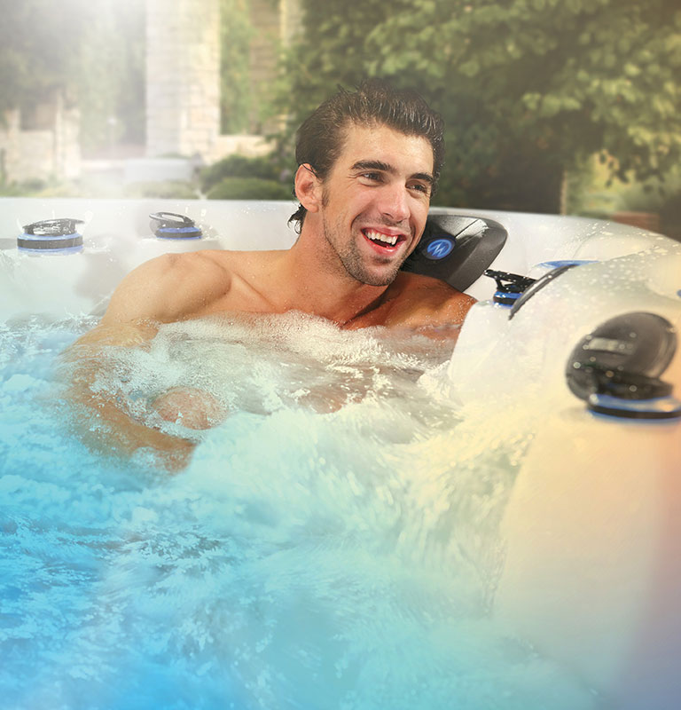 Michael phelps relaxing in a master spas hot tub